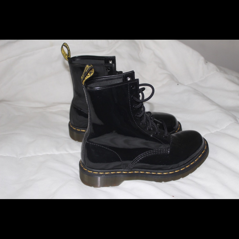 Shiny black Doc martens